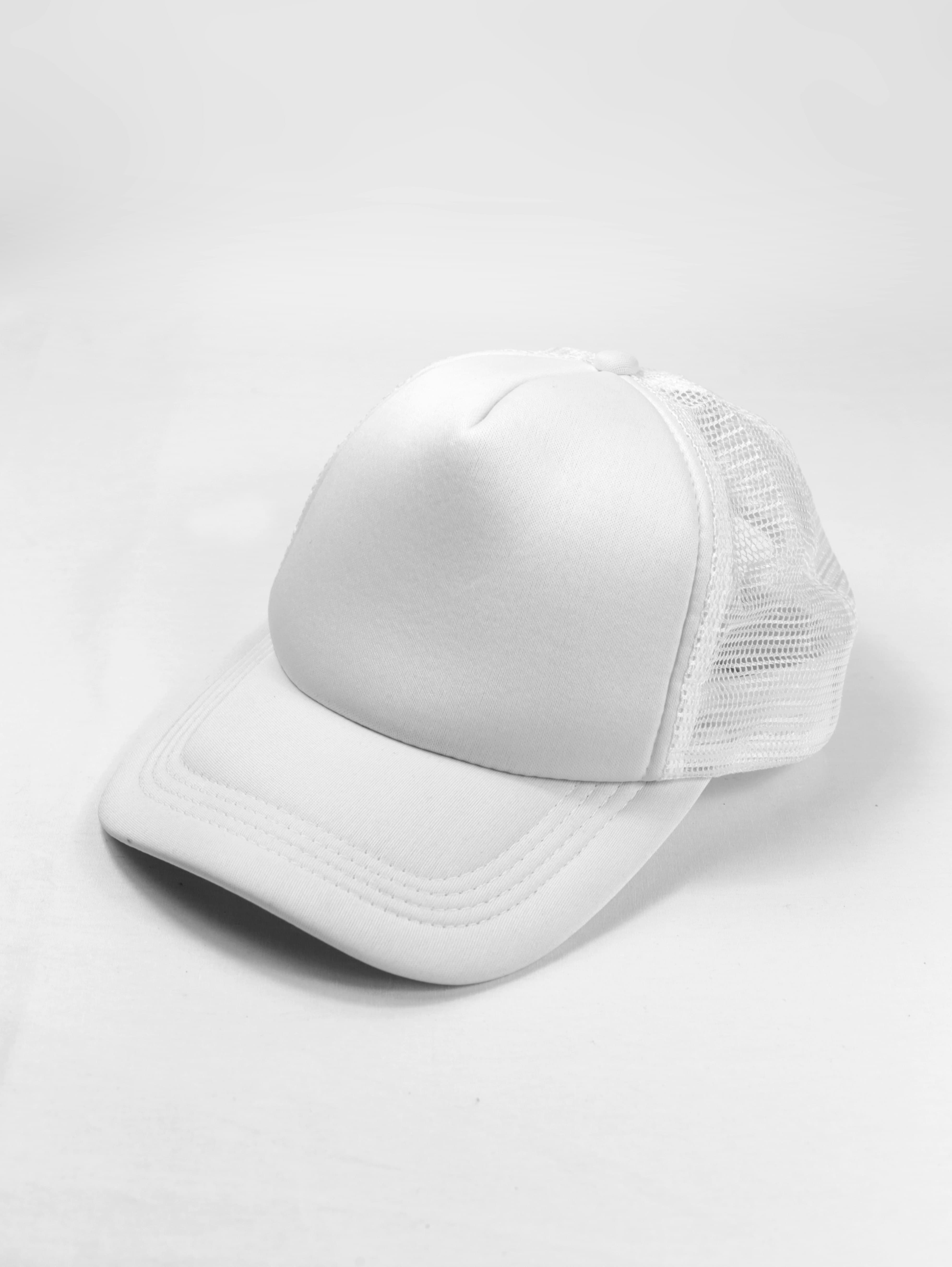 White trucker cap on a white surface
